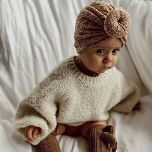 Adorable baby knotted beanies made with soft cotton fabric