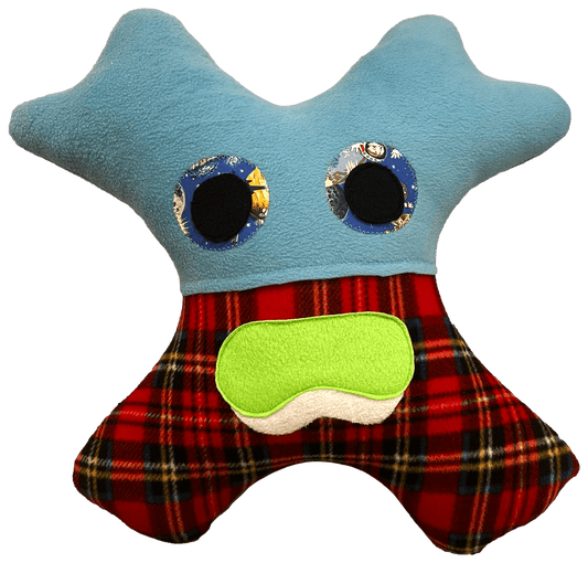 Soft handmade monster pillow crafted for cozy naps on road journeys