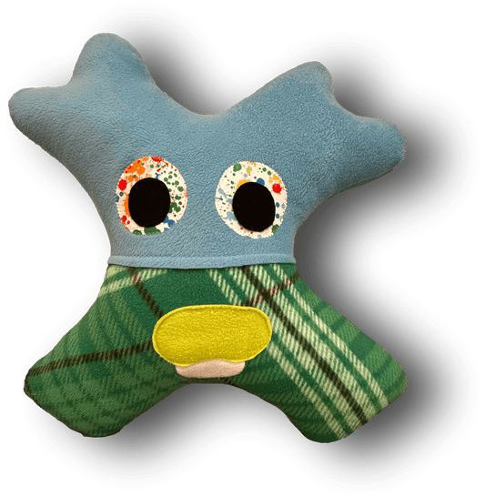 Soft handmade monster pillow crafted for cozy naps during car journeys