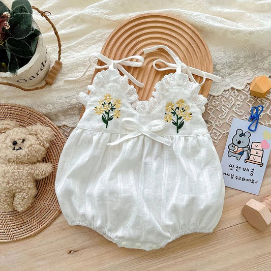 Baby lace jumpsuit designed for newborn comfort and elegance
