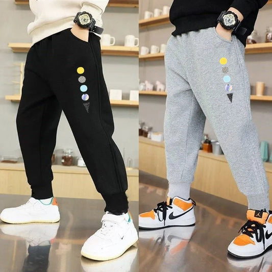 Cosmic Planet kids sweatpants crafted with durable playful space design