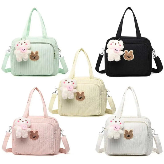 Cute cartoon diaper bag crafted with waterproof storage for baby essentials