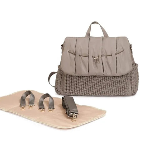 Mom’s Ultimate Travel Bag with waterproof design keeps baby essentials safe, organized, and accessible for stress-free outings and family adventures.