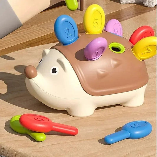 Montessori Hedgehog Training Toy builds motor skills and early learning through fun peg play, helping toddlers develop focus, coordination, and creativity.