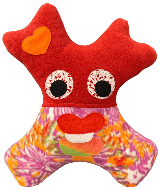 Soft monster pillow crafted for cozy child car ride naps