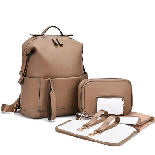 Ultimate Diaper Backpack with built-in changing station and insulated bottle pocket ensures stress-free parenting and organized travel every day.
